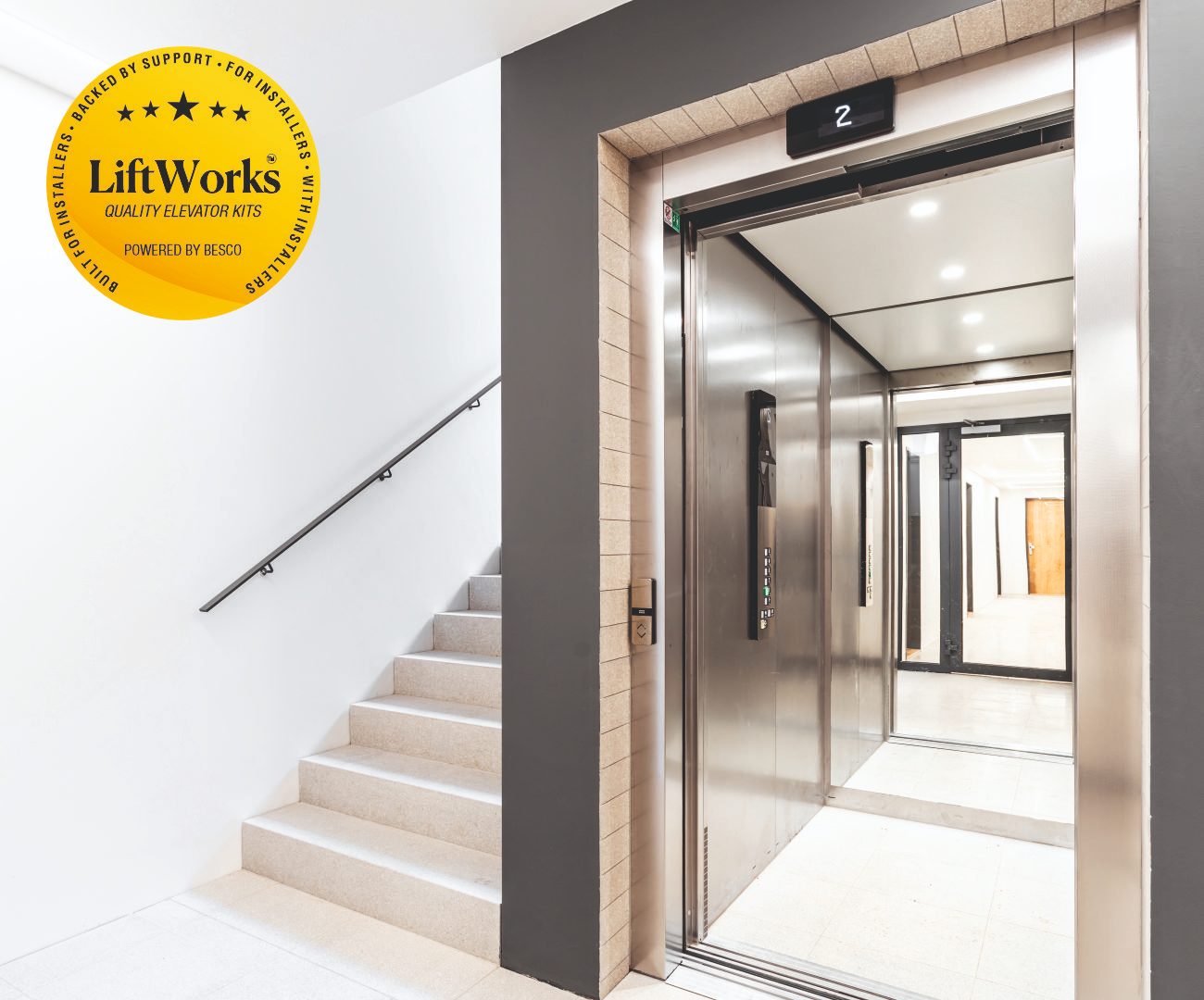 LiftWorks elevator installed beside a staircase
